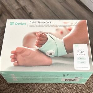 Owlet Dream Sock in Mint Green. New in sealed box